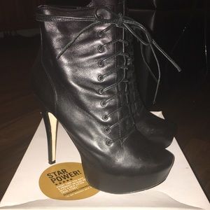 Aldo women’s black high heel platform boot Size 9